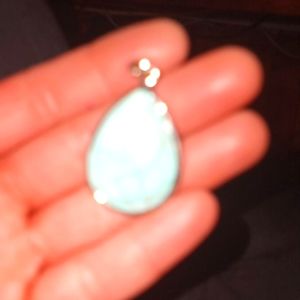 Genuine turquoise charm